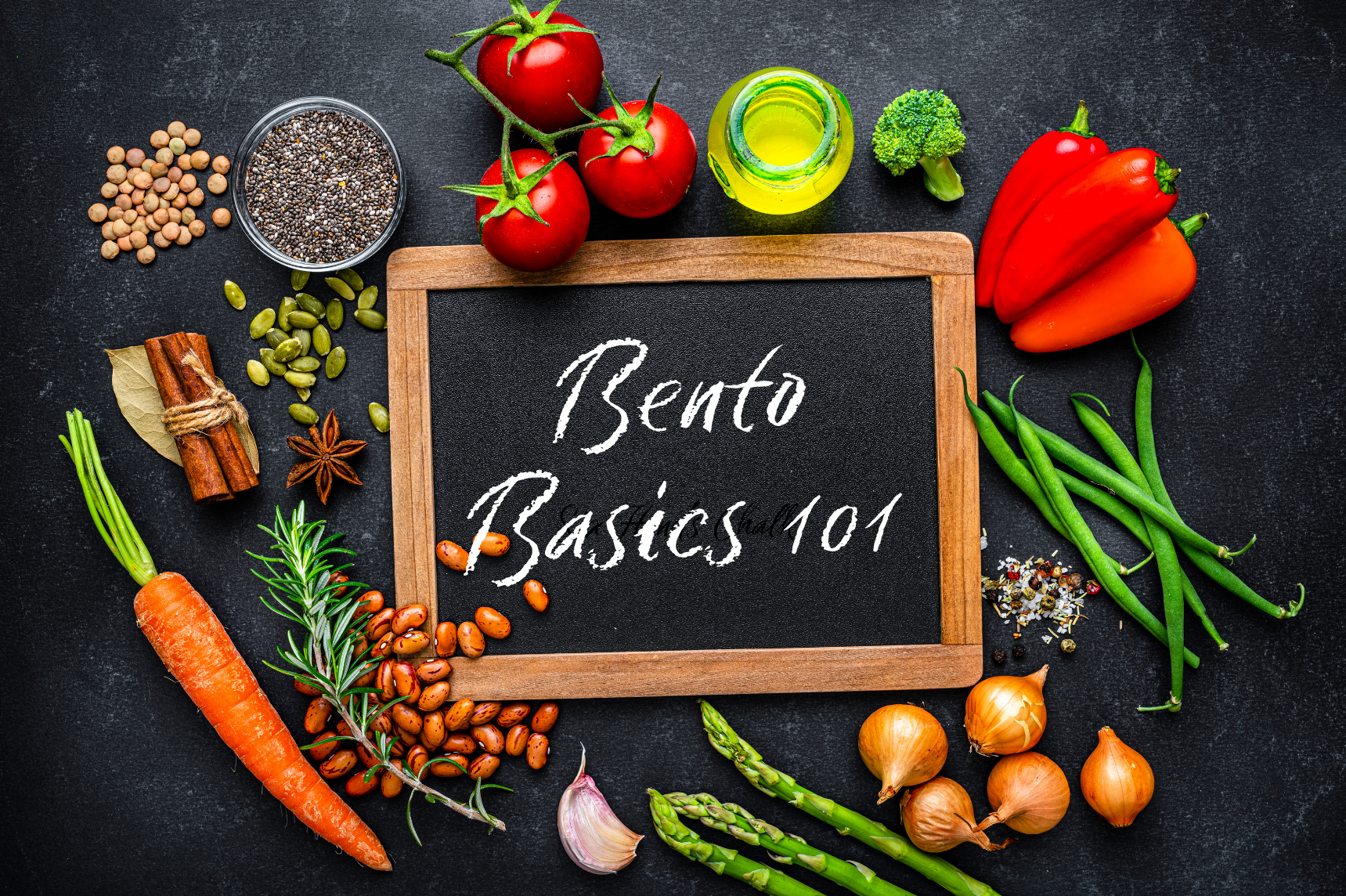 Blackboard surrounded by veggies with Bento Basics 101 written on it