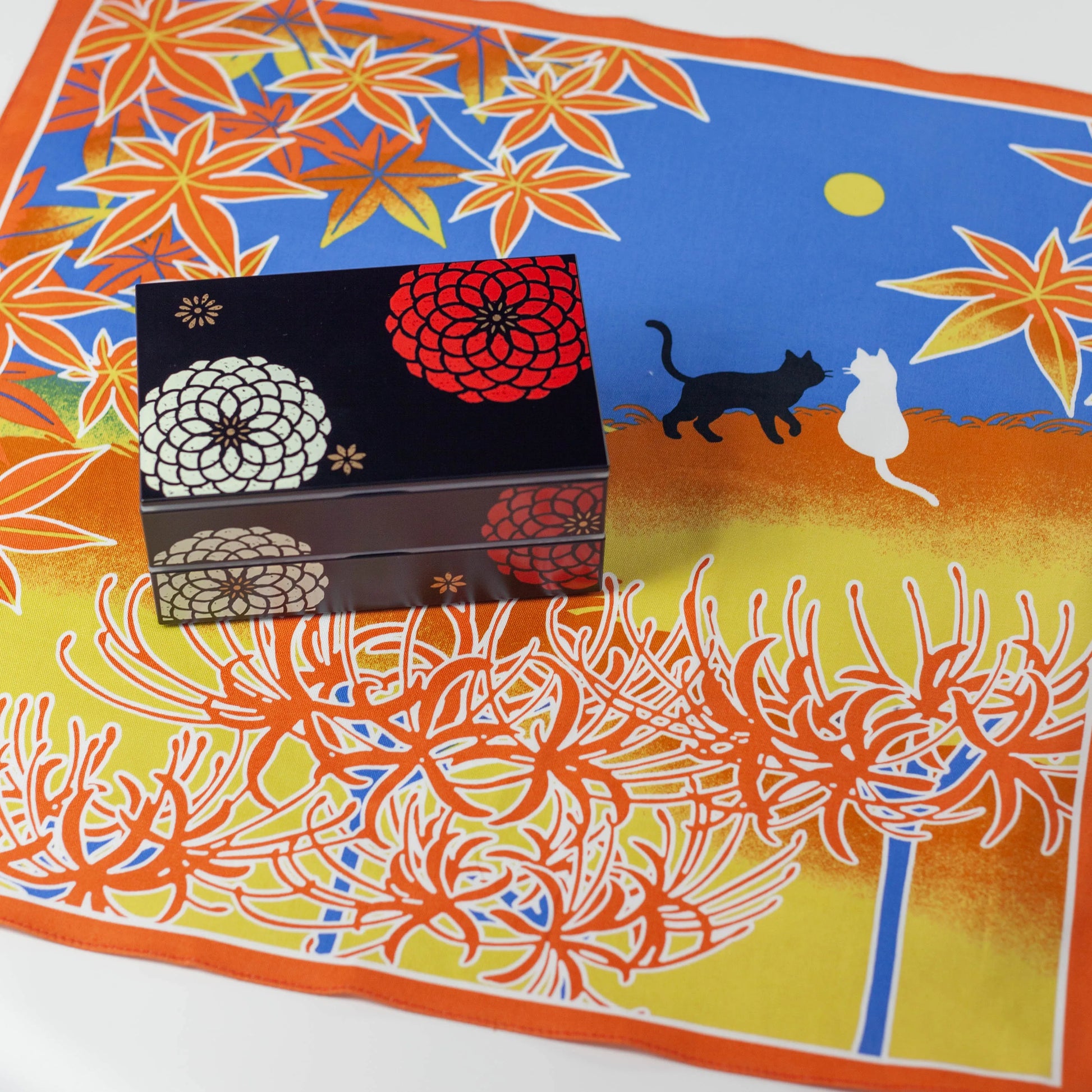 Shiki Neko Fall Furoshiki with black and white cats under a full moon, red maple leaves, and spider lilies