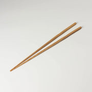 Pair of 30cm bamboo chopsticks with twisted handles and tapered tips on a white background