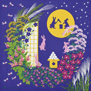Japanese cotton furoshiki cloth designed by Misato Asayama with blue starry background, autumn floral wreath, and moon rabbits