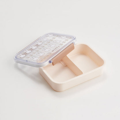 Rectangular lunch box with a bunny pattern and a beige body opened on a white background